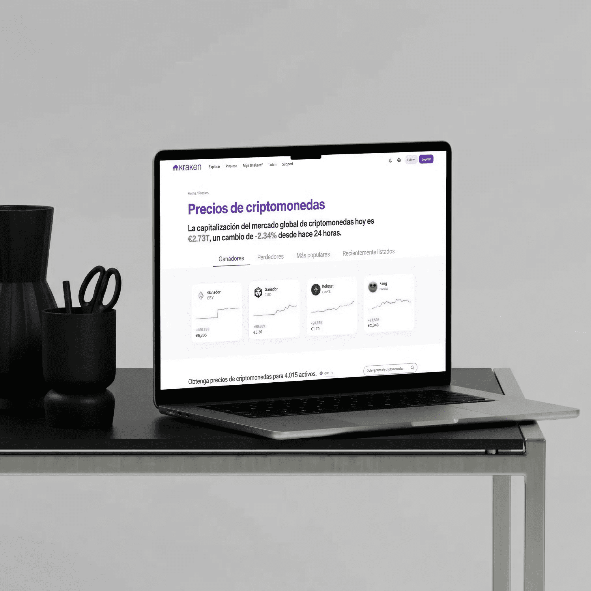 Página de Kraken mostrando los precios de criptomonedas y el mercado global de criptoactivos en un ordenador portátil